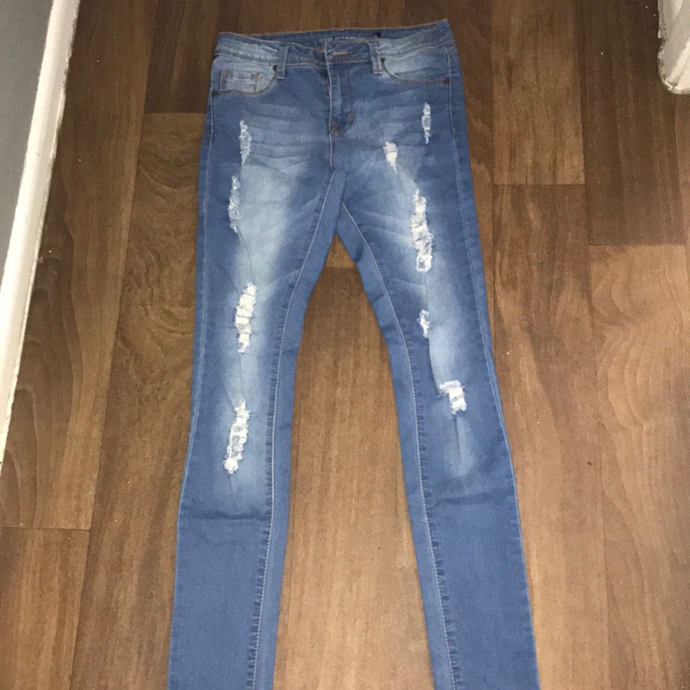 Light colored ripped jeans